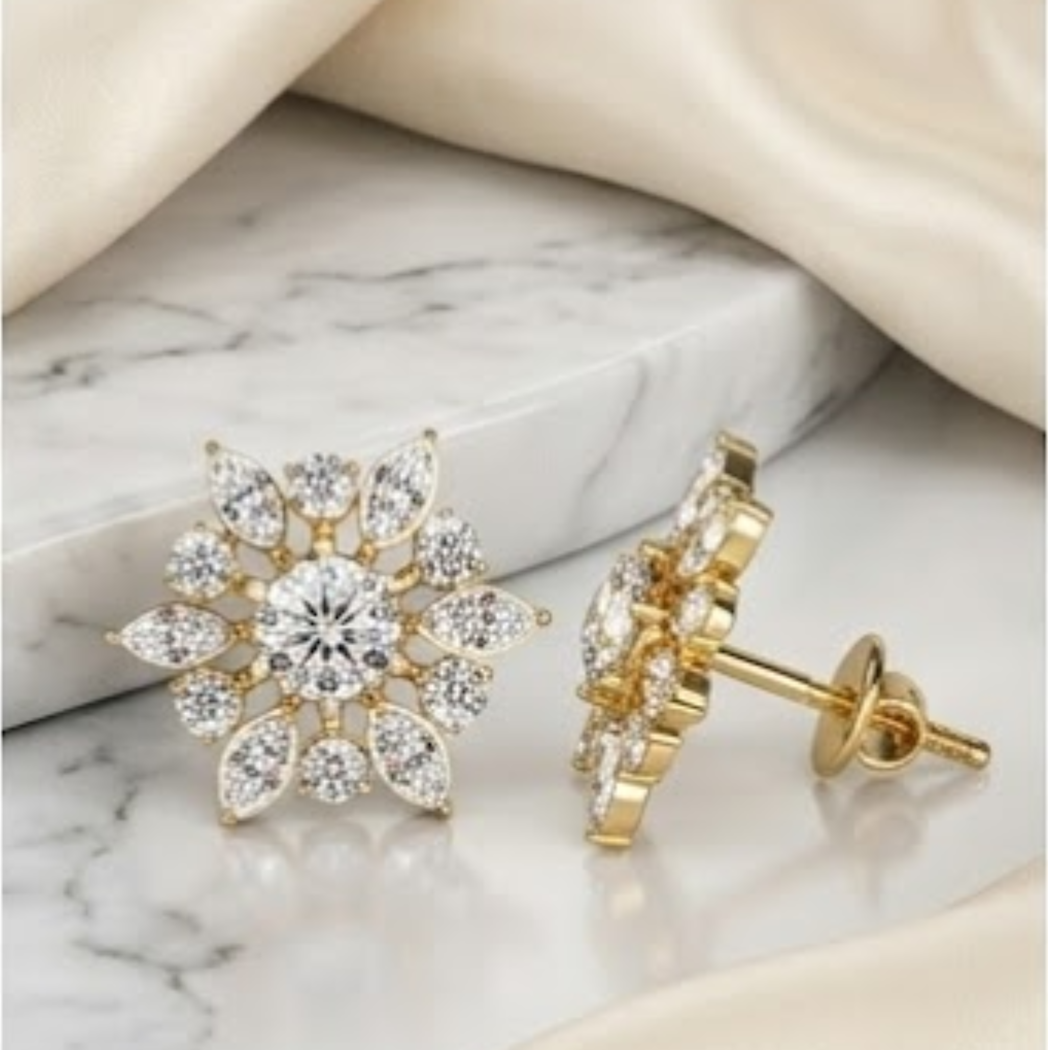 Gold earrings with diamond-like stones on a marble surface lab grown diamond in Hyderabad