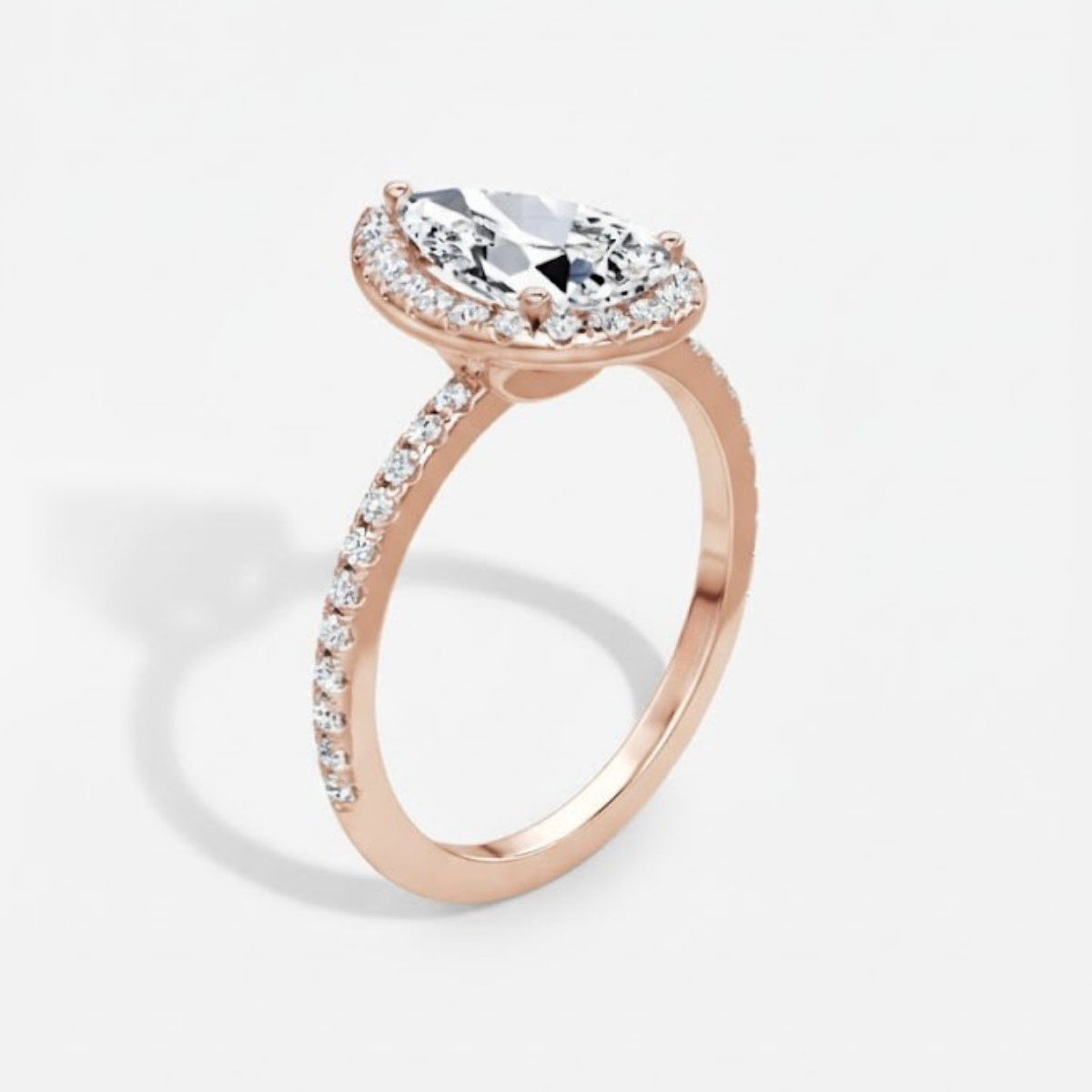 Angelica Pear Solitaire Pavé Ring with a Classic Halo