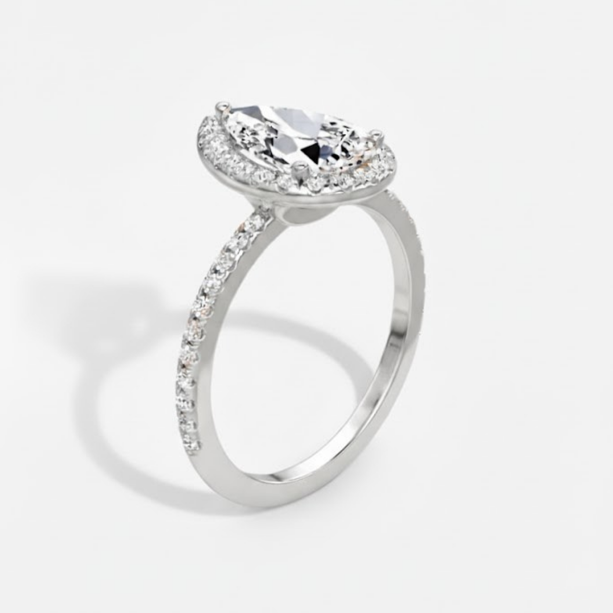 Angelica Pear Solitaire Pavé Ring with a Classic Halo