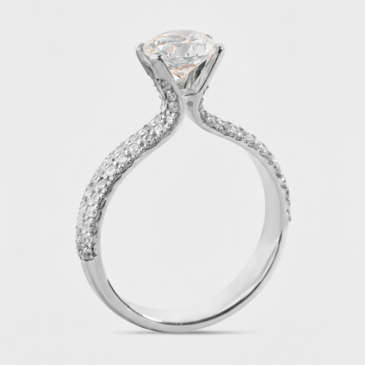 AURORA TRIPLE PAVE RING WITH A ROUND SOLITAIRE