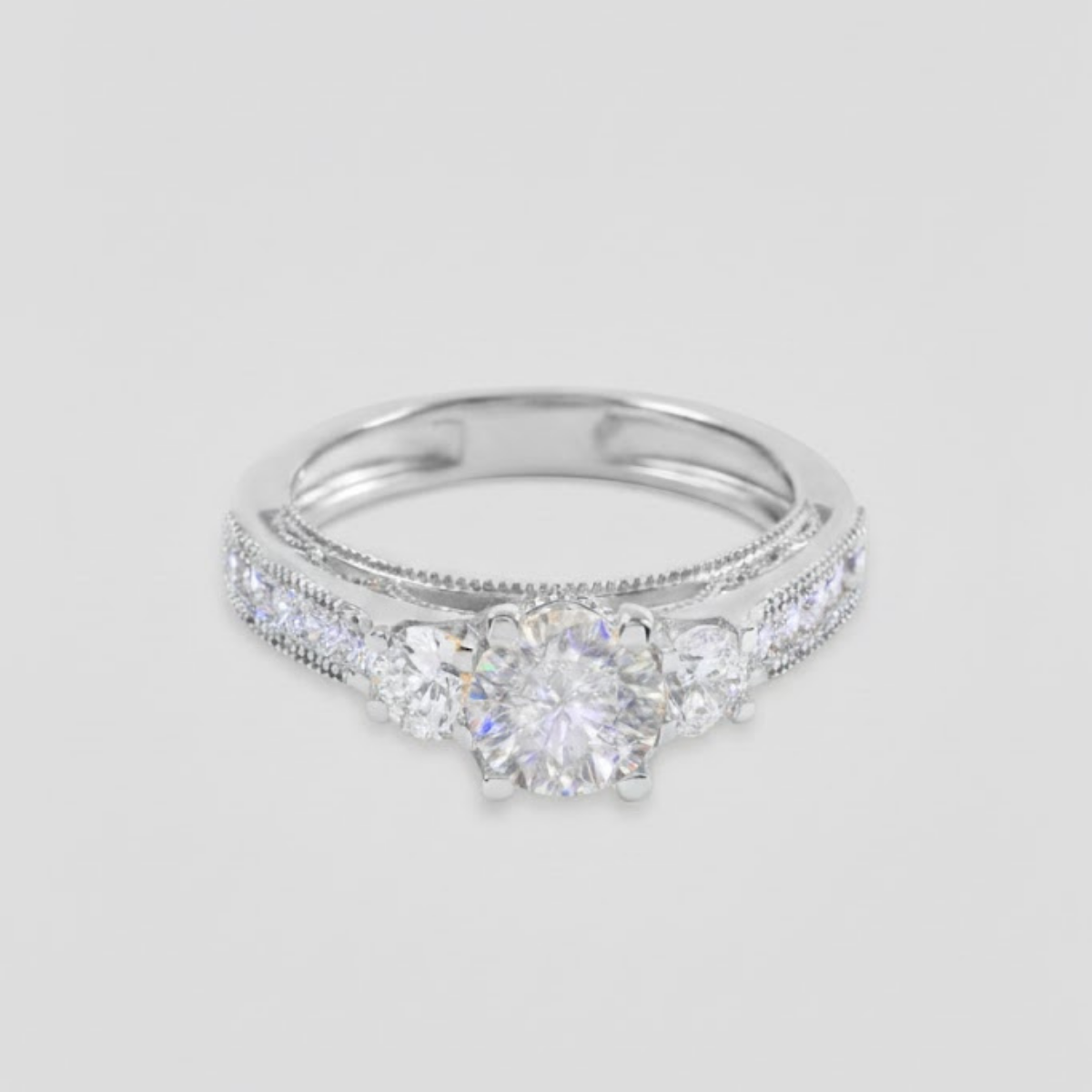 Ahania Trilogy Round Brilliant Solitaire Pave Ring