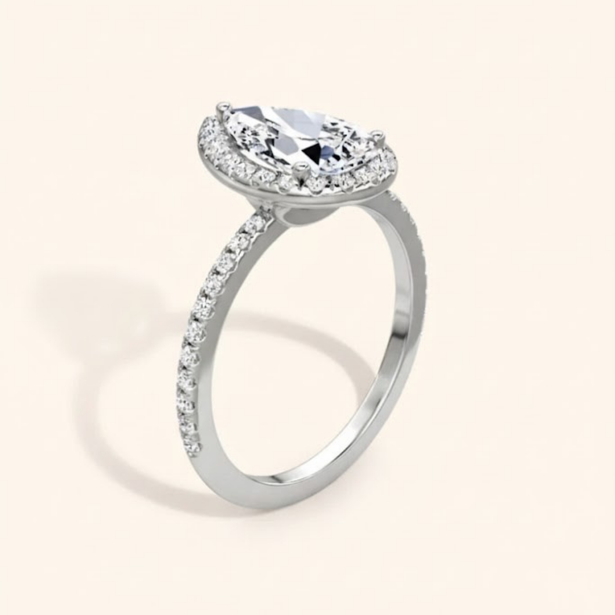Angelica Classic Halo with a 1 Ct Pear Solitaire Pave Ring