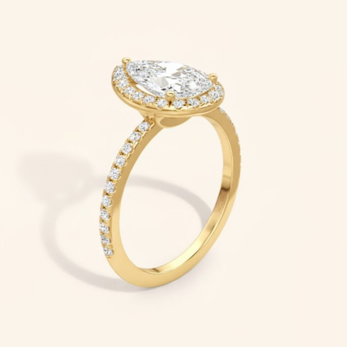 Angelica Classic Halo with a 1 Ct Pear Solitaire Pave Ring