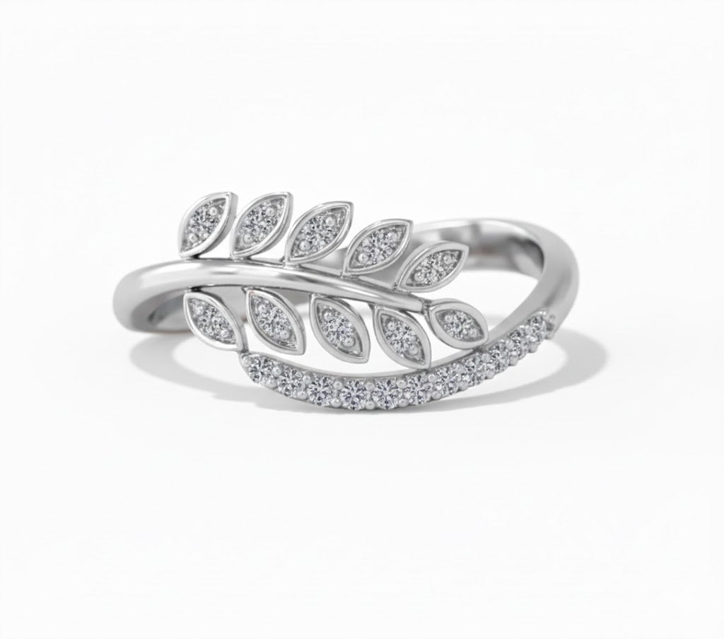 Silver leaf-shaped ring with embedded stones on a white background, lab grown diamond in hyderabad
