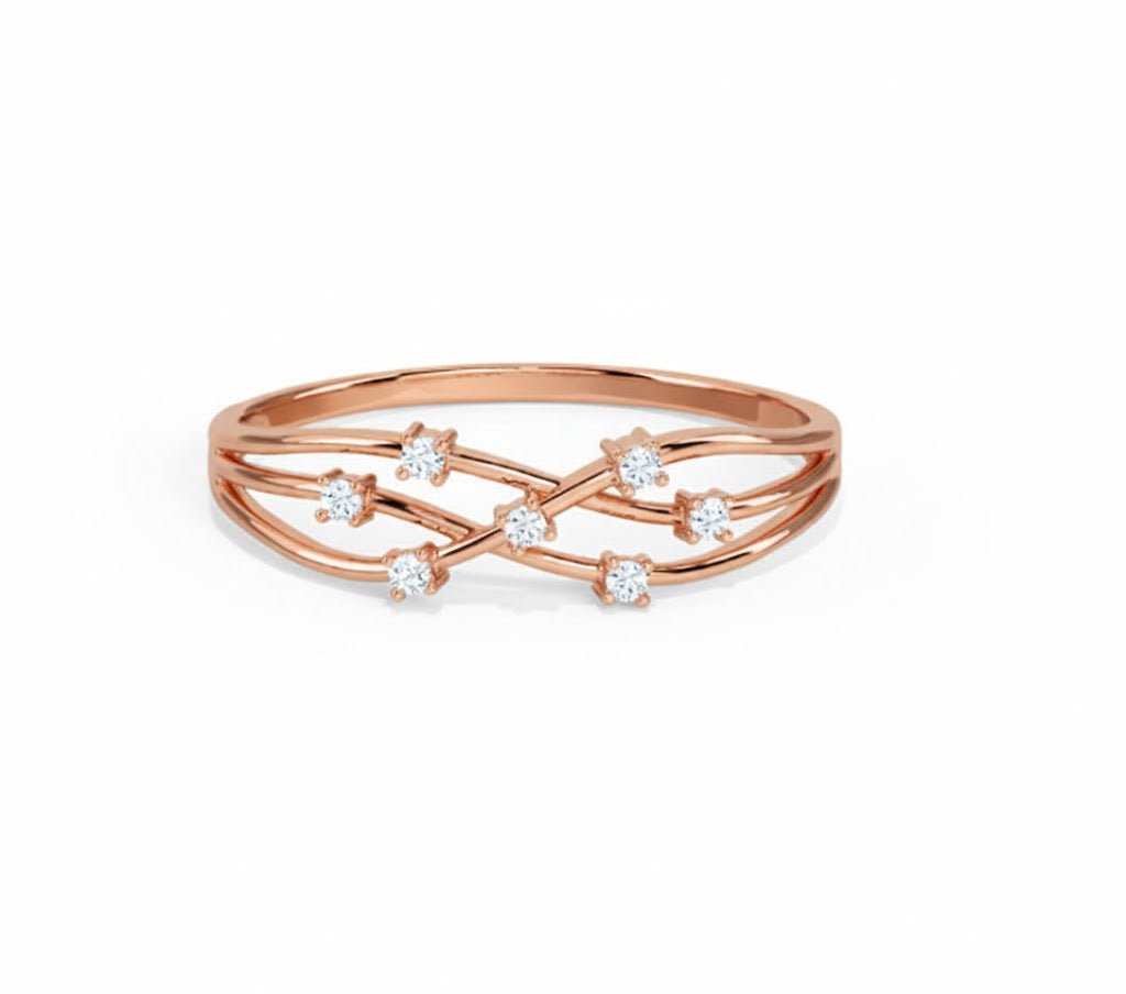 Rose gold ring with diamond accents on a white background, lab grown diamond in hyderabad