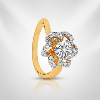 Gold and silver ring with a diamond on a light gray background, lab grown diamond in hyderabad