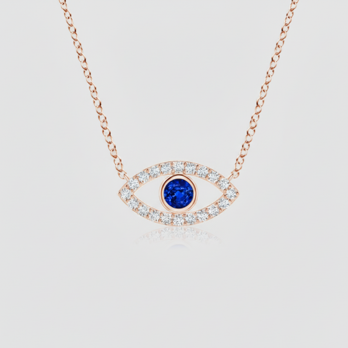 Blue Sapphire Evil Eye Pendant with Diamond Accents with Chain