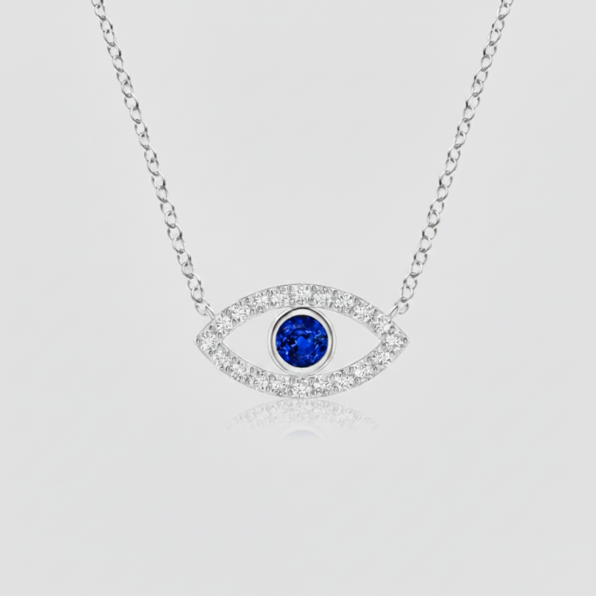 Blue Sapphire Evil Eye Pendant with Diamond Accents with Chain