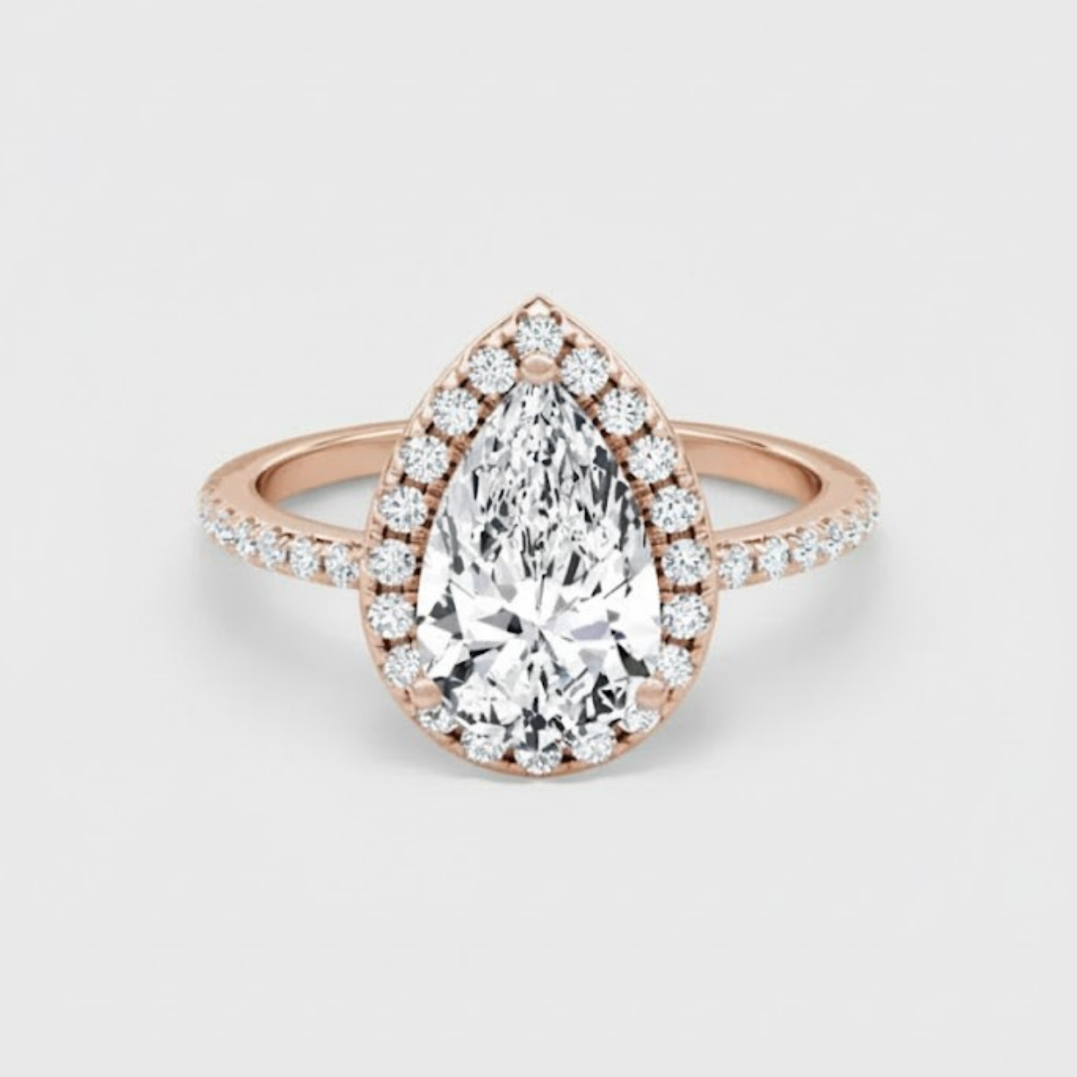Angelica Pear Solitaire Pavé Ring with a Classic Halo
