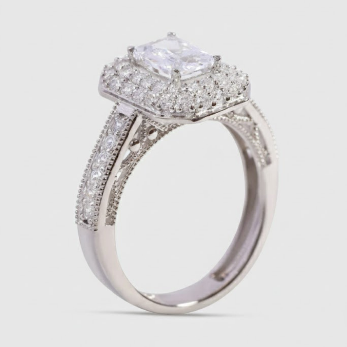 Celestina Double Studded Halo & Pave Ring with Emerald Solitaire