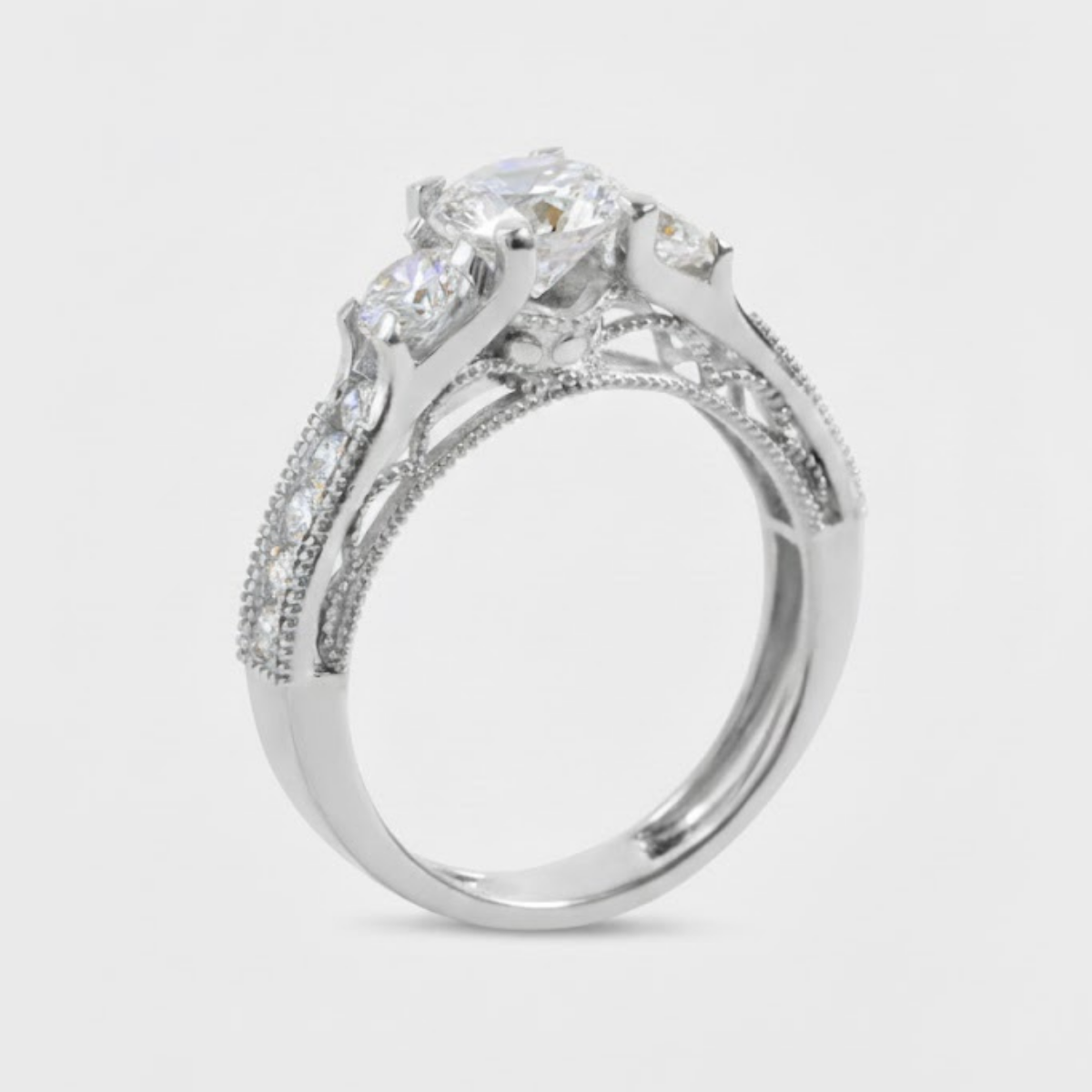 Ahania Trilogy Round Brilliant Solitaire Pave Ring