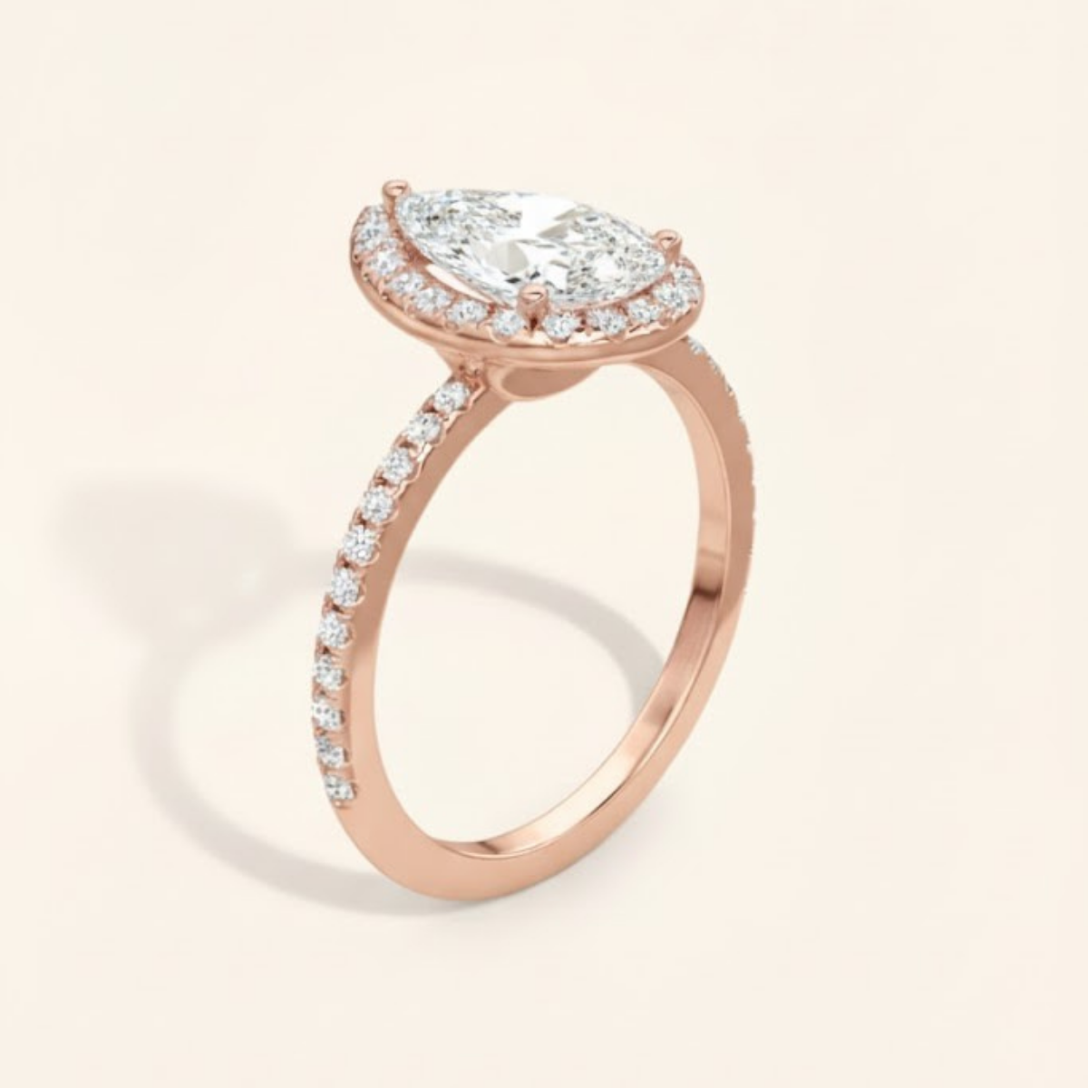 Angelica Classic Halo with a 1 Ct Pear Solitaire Pave Ring
