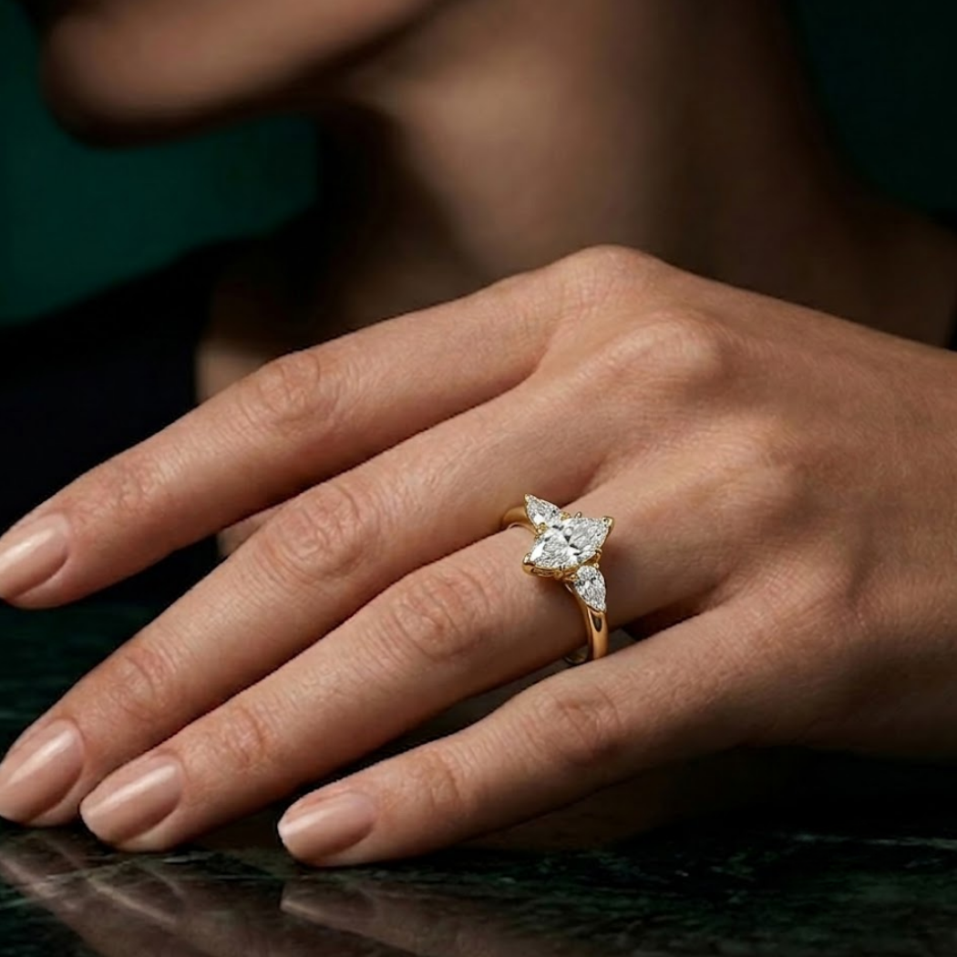 Marquise Diamond Ring With Pear Side Stones