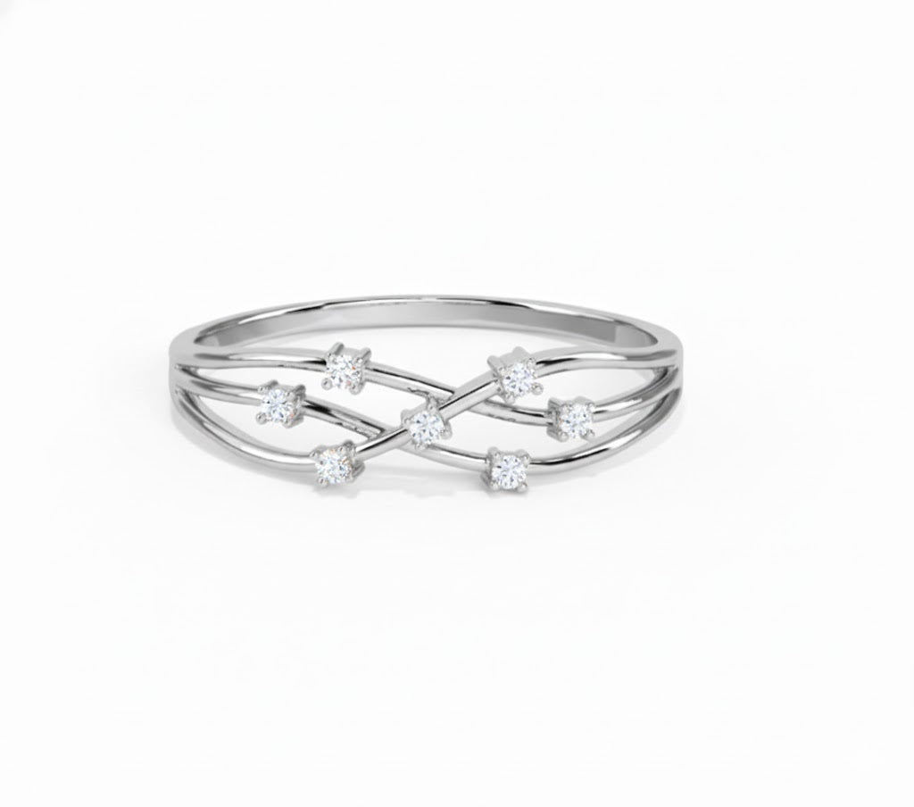 Silver ring with small diamonds on a white background, lab grown diamond in hyderabad